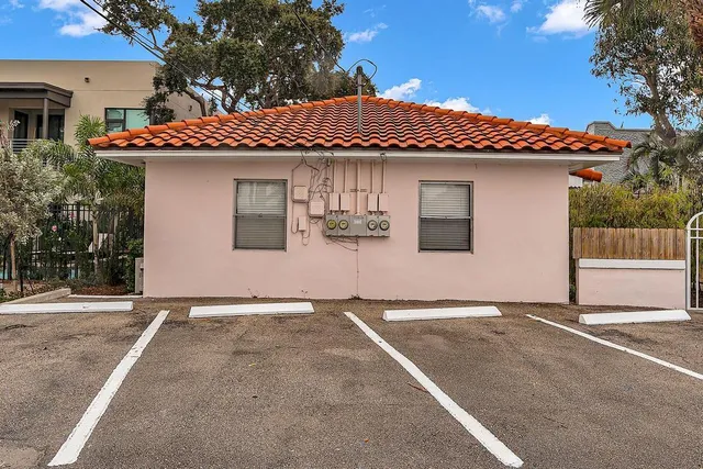 a front view of a house with a garage