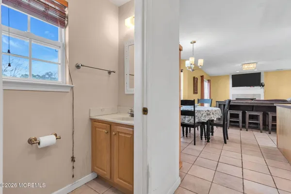 a view of kitchen with furniture and window