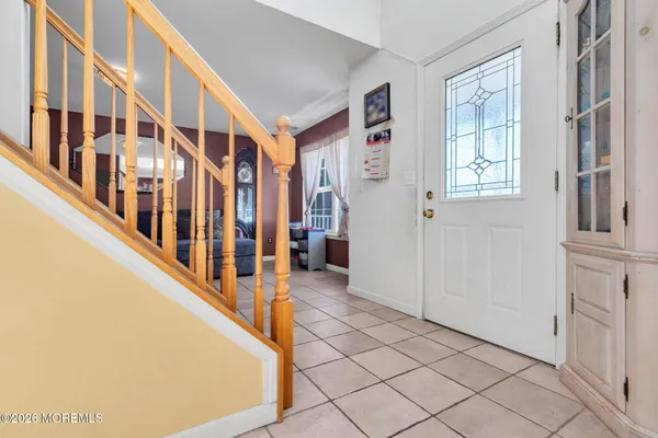 a view of an entryway with a stairs