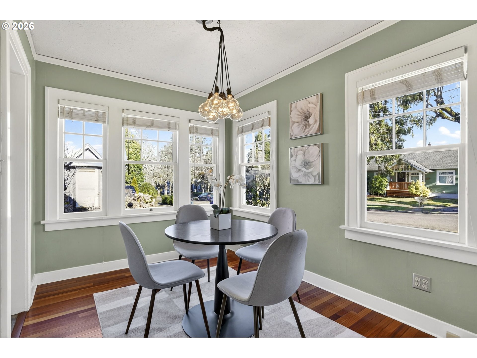 3923 Northeast 76th Avenue Portland, OR 97213 - Photo 11 of 48 a dining room with furniture a chandelier and a rug