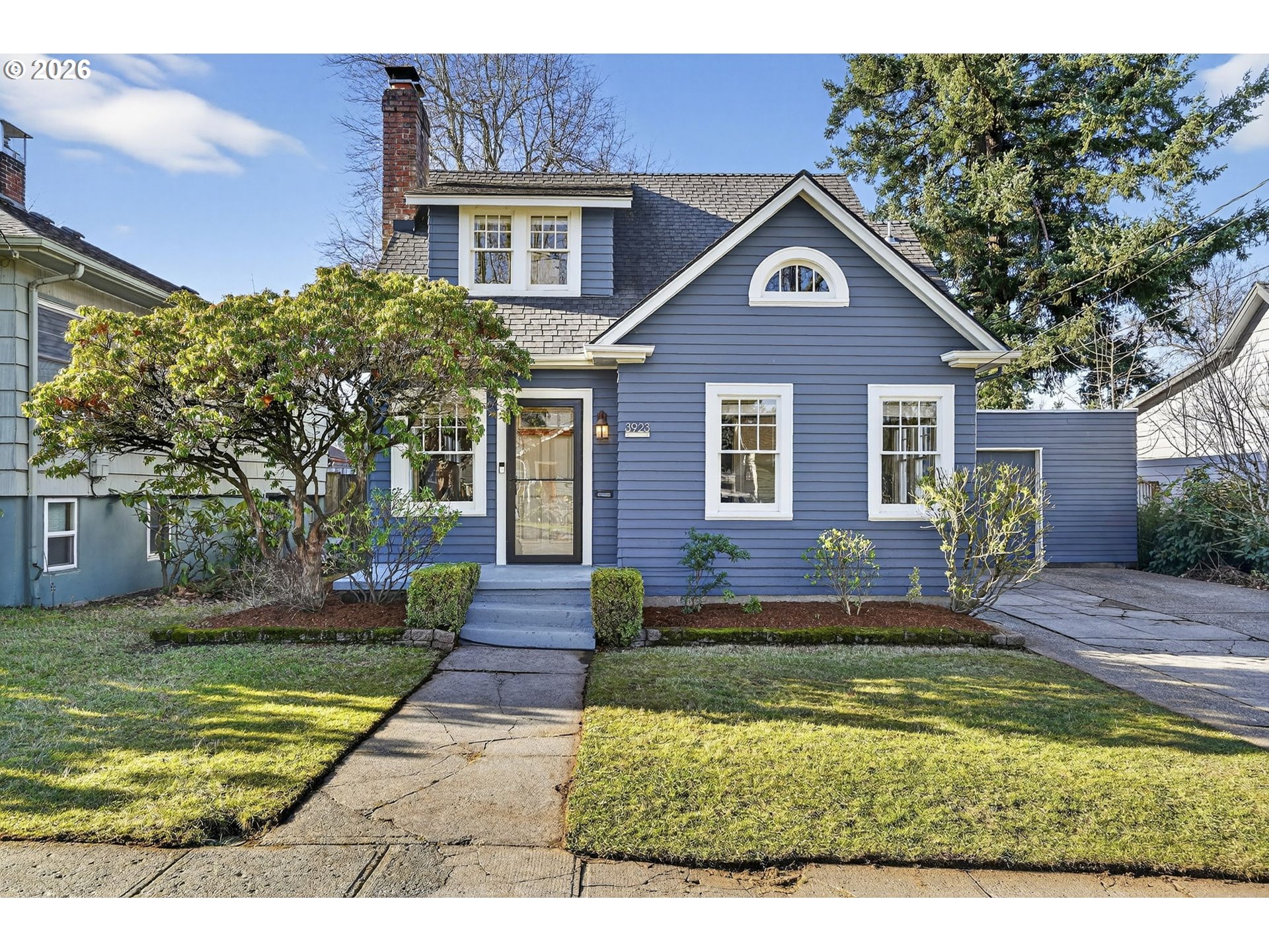 3923 Northeast 76th Avenue Portland, OR 97213 - Photo 3 of 48 a front view of a house with a yard