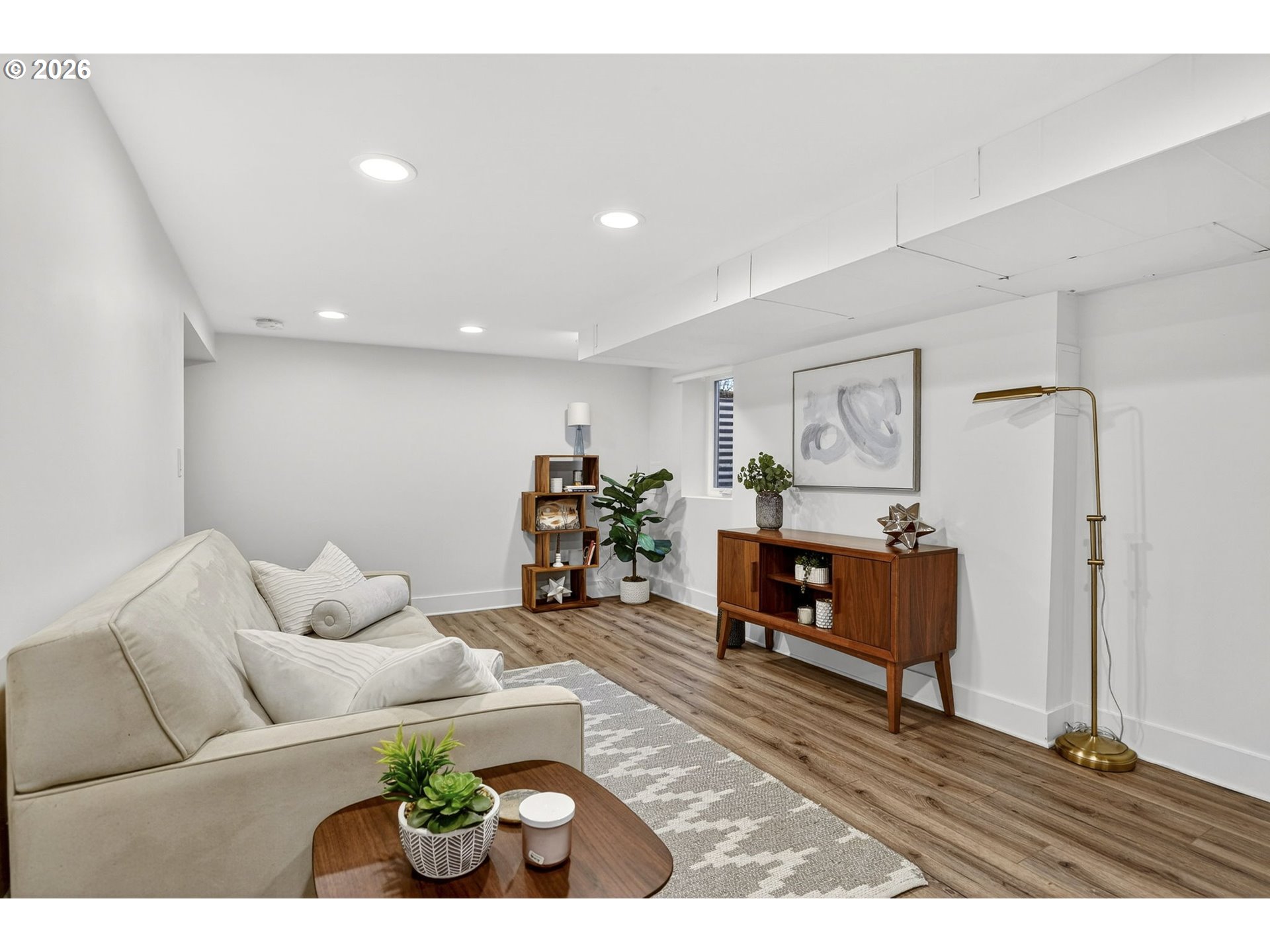 3923 Northeast 76th Avenue Portland, OR 97213 - Photo 34 of 48 a living room with furniture and a wooden floor