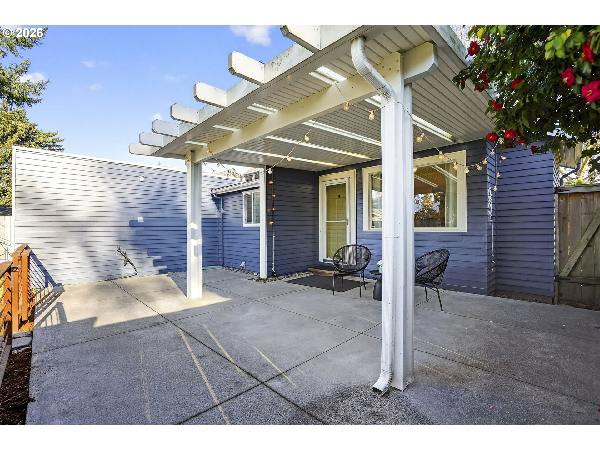 3923 Northeast 76th Avenue Portland, OR 97213 - Photo 38 of 48 a view of a patio with table and chairs and potted plants