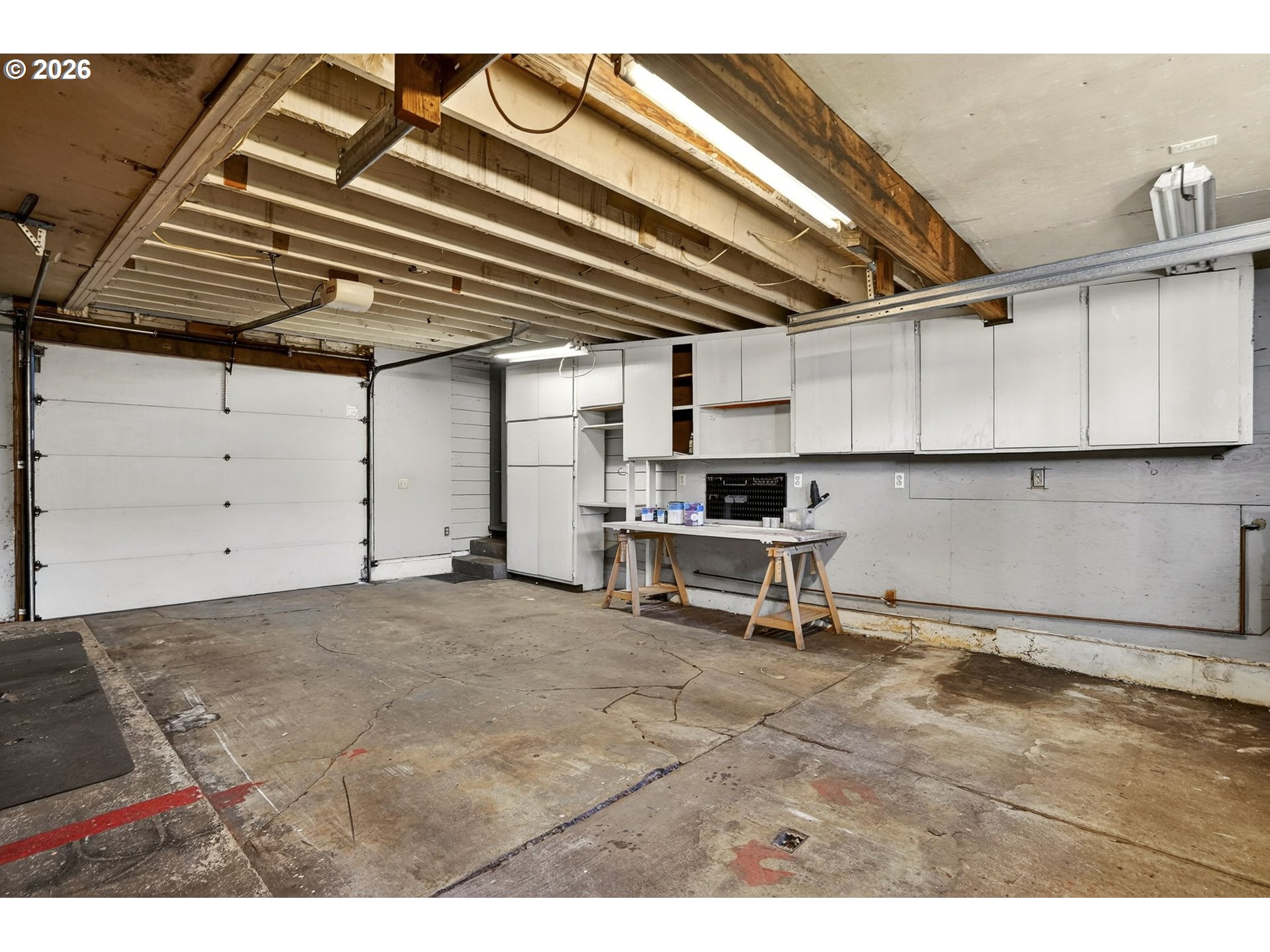 3923 Northeast 76th Avenue Portland, OR 97213 - Photo 47 of 48 a view of a room with gym equipment and a view of living room