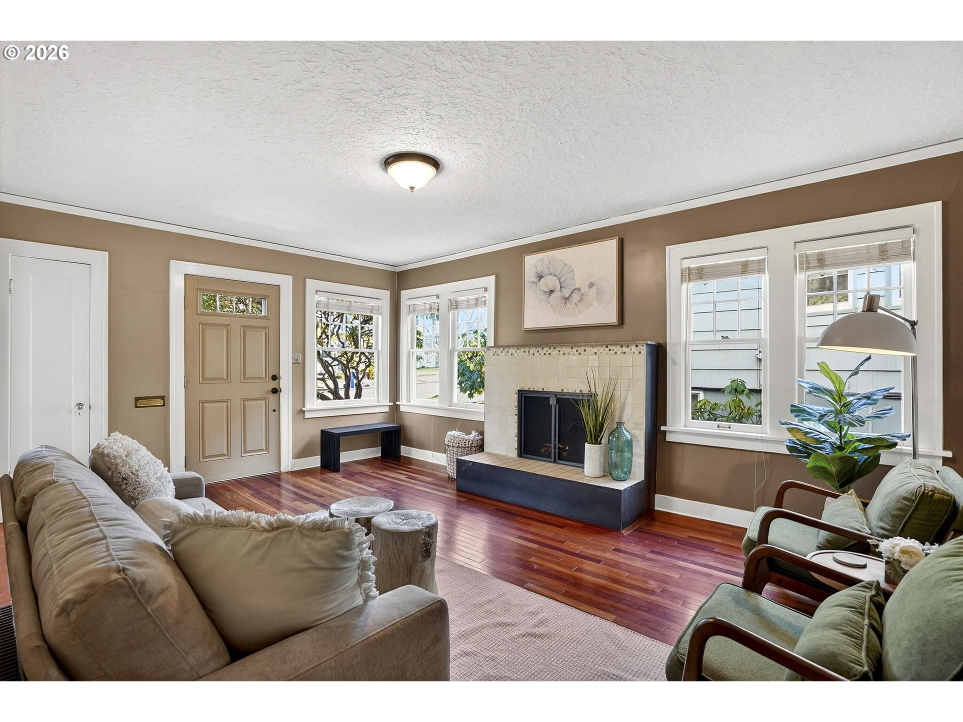 3923 Northeast 76th Avenue Portland, OR 97213 - Photo 8 of 48 a living room with furniture and a fireplace