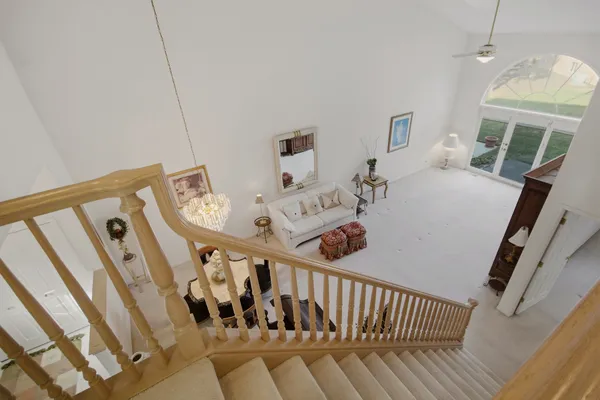 a view of a balcony with furniture