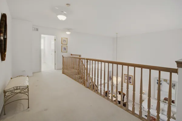 a view of a hallway with workspace
