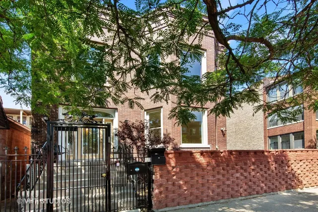 a view of house with a tree