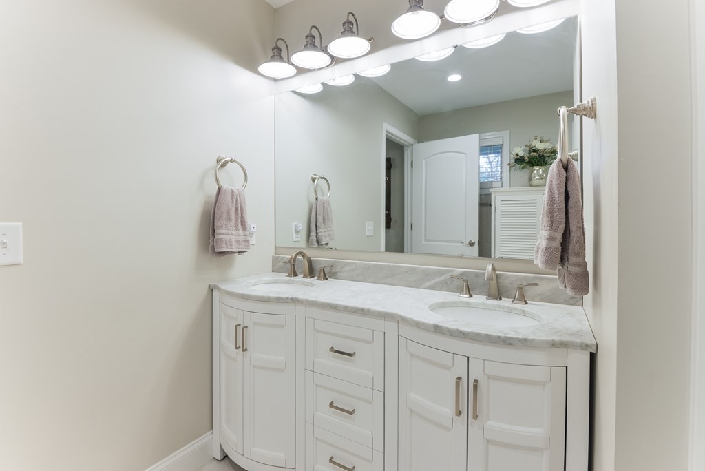3741 Airport Road Southeast Dalton, GA 30721 - Photo 46 of 70 a bathroom with a sink vanity and a mirror