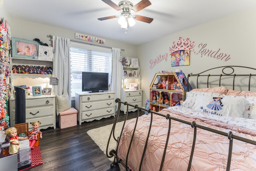 3741 Airport Road Southeast Dalton, GA 30721 - Photo 54 of 70 a bedroom with furniture and a flat screen tv