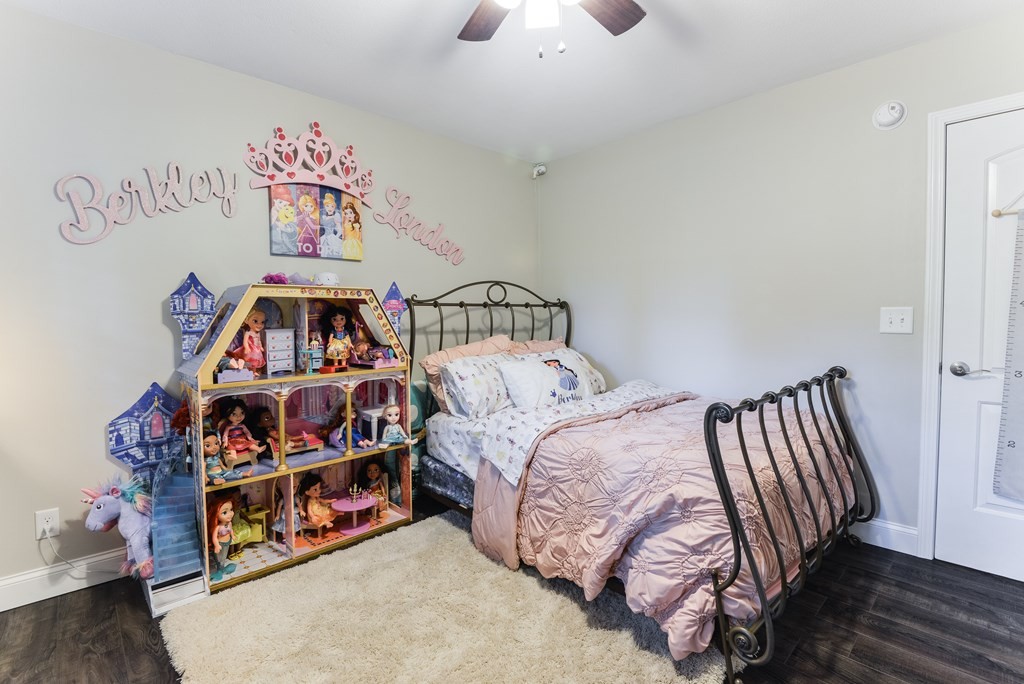 3741 Airport Road Southeast Dalton, GA 30721 - Photo 55 of 70 a bedroom with a bed and a book shelf