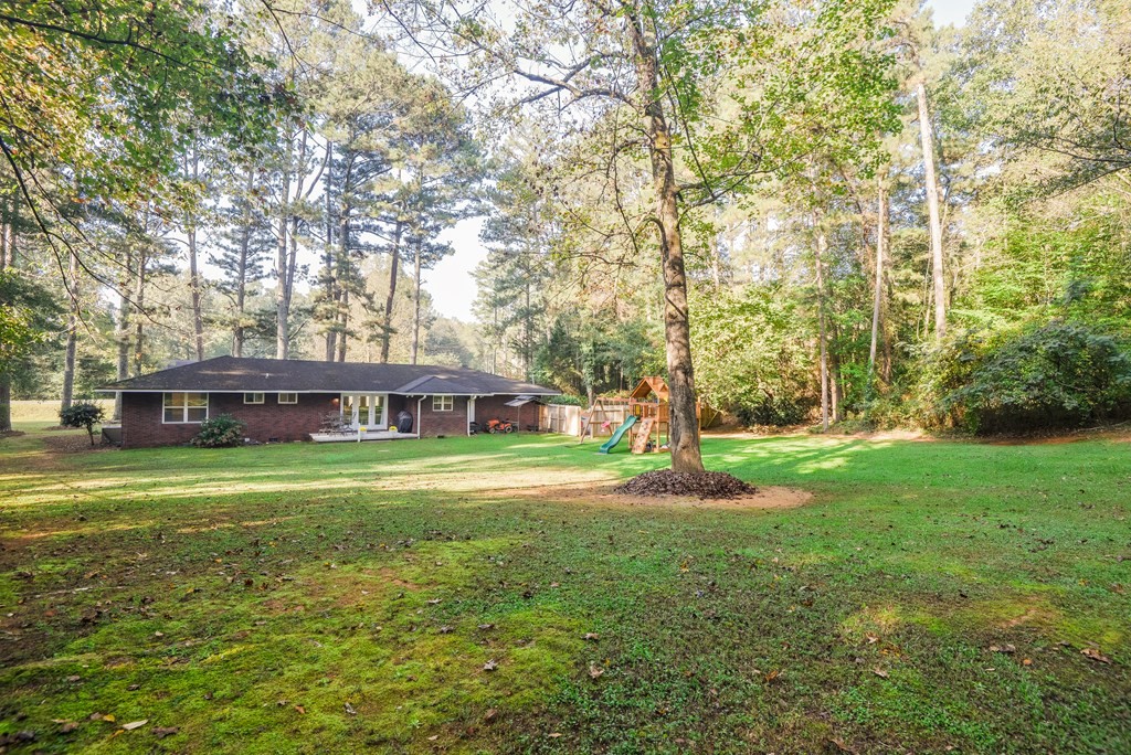 3741 Airport Road Southeast Dalton, GA 30721 - Photo 66 of 70 a front view of a house with a yard