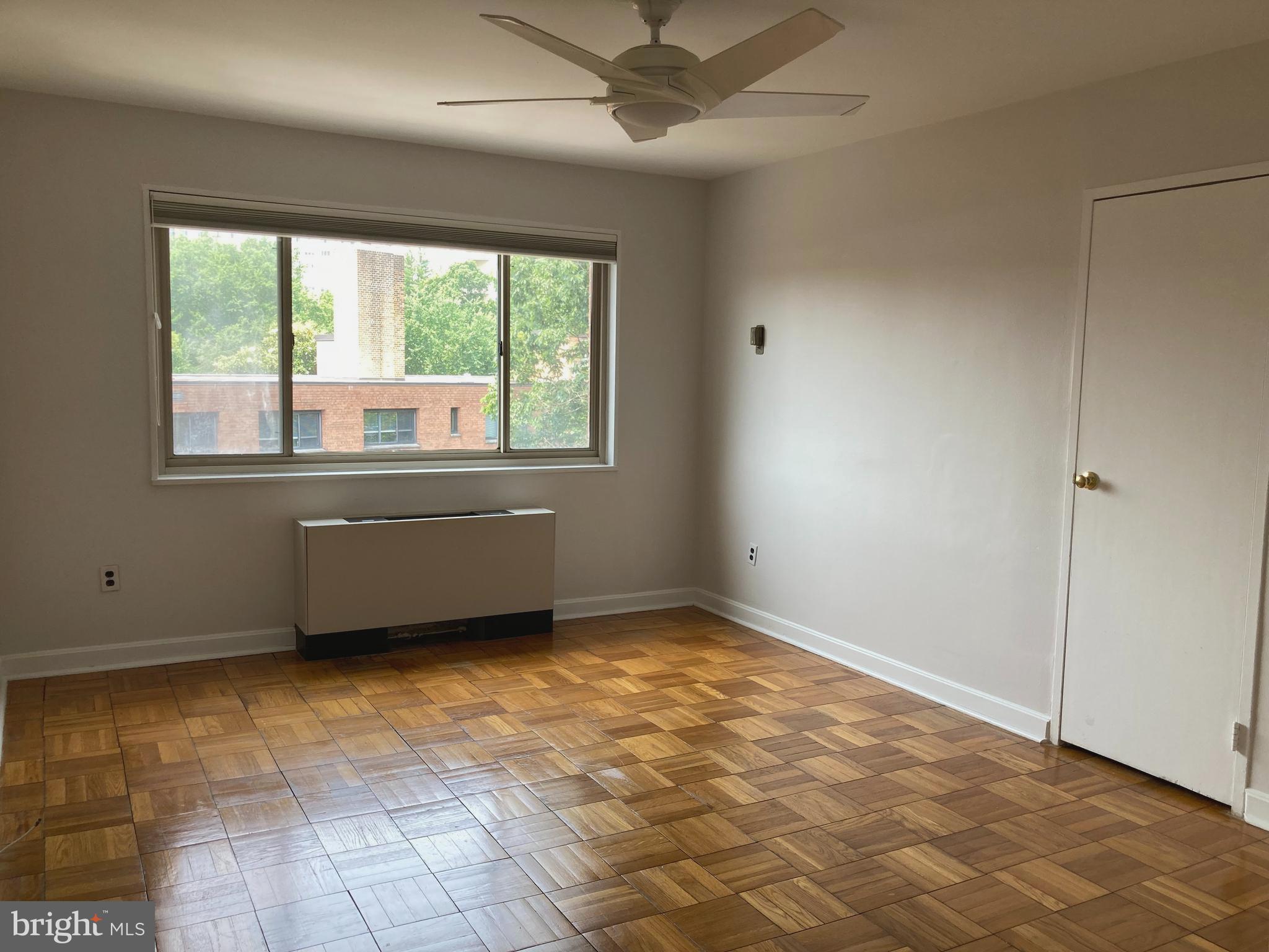 3900 Tunlaw Road Northwest, Unit 419 Washington, DC 20007 - Photo 8 of 19 Spacious west facing bedroom