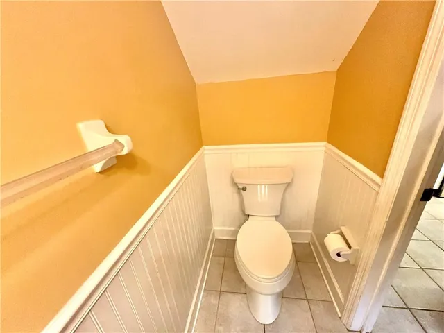 a bathroom with a toilet and a sink