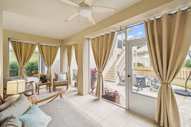 a kitchen with a refrigerator a sink and a window