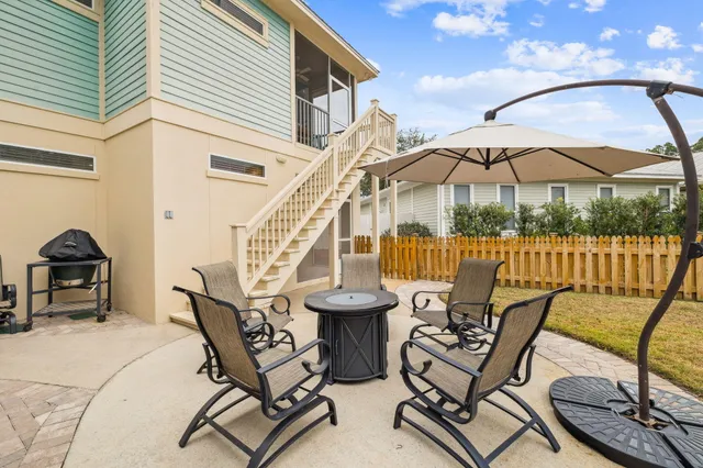 a kitchen with stainless steel appliances a stove a sink and a microwave