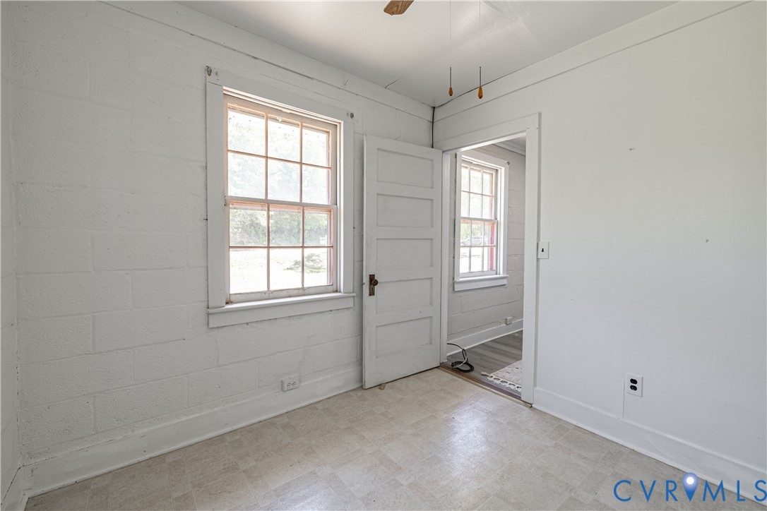 933 Pleasant Point Road Surry, VA 23883 - Photo 19 of 45 an empty room with windows