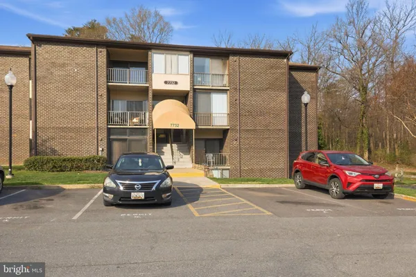 a car parked in front of a house