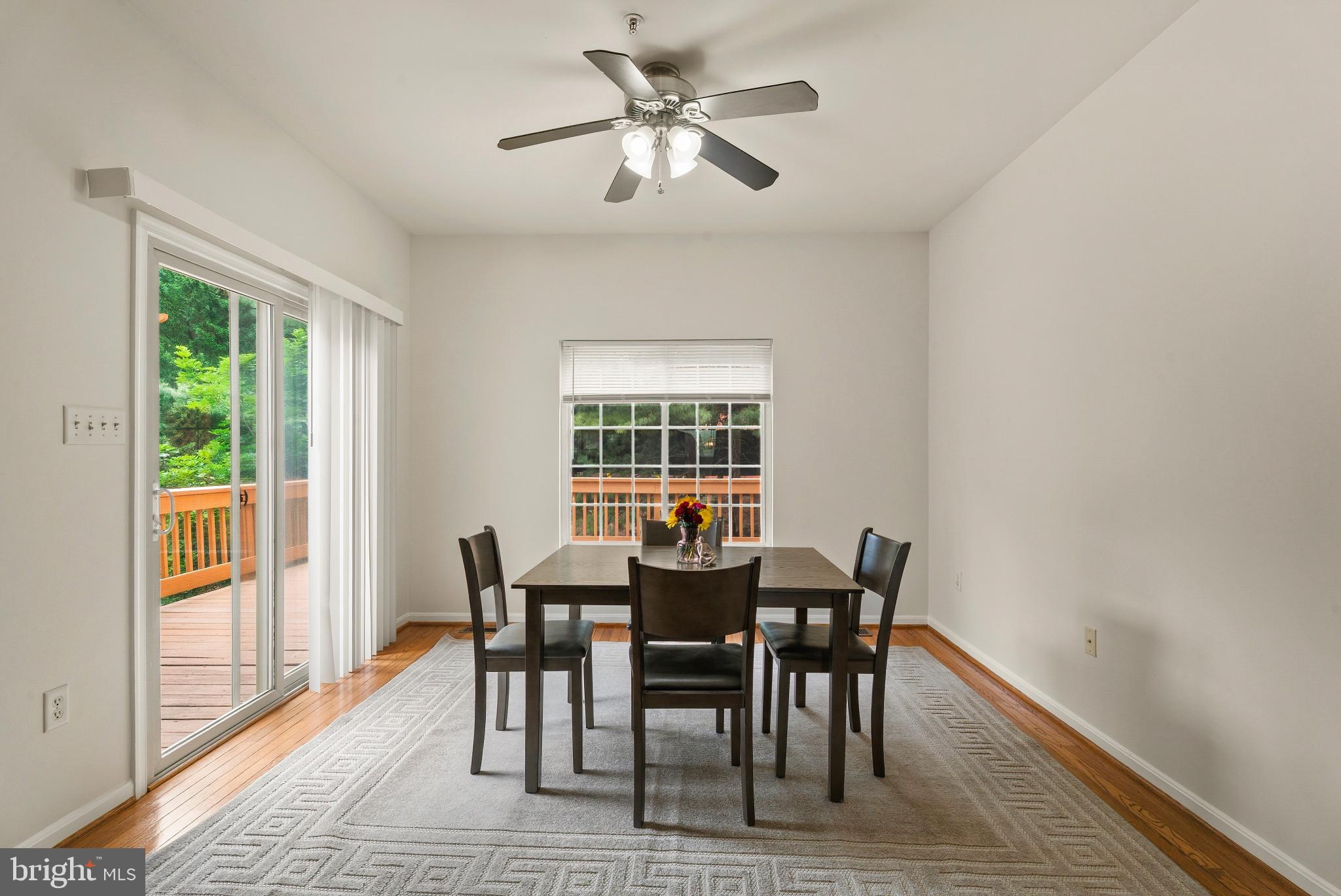 1709 Woodruff Way Frederick, MD 21701 - Photo 15 of 42 a view of a dining room with furniture window and outside view