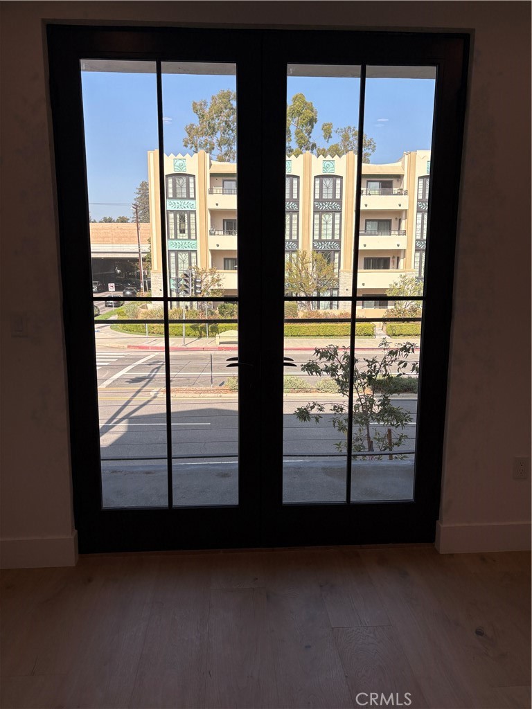 10352 Riverside Drive, Unit 201 Toluca Lake, CA 91602 - Photo 20 of 49 a view of a large window with an outdoor view