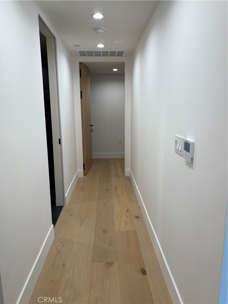 10352 Riverside Drive, Unit 201 Toluca Lake, CA 91602 - Photo 29 of 49 an entryway door with a hallway in the house