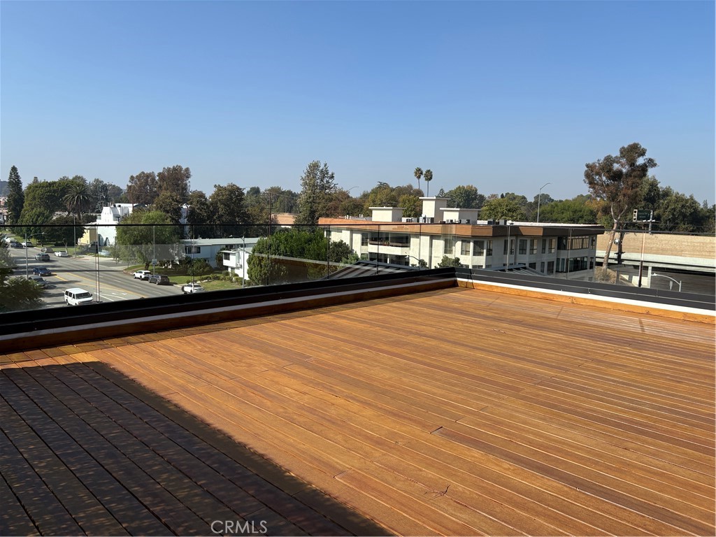 10352 Riverside Drive, Unit 201 Toluca Lake, CA 91602 - Photo 40 of 49 a view of a lake with houses