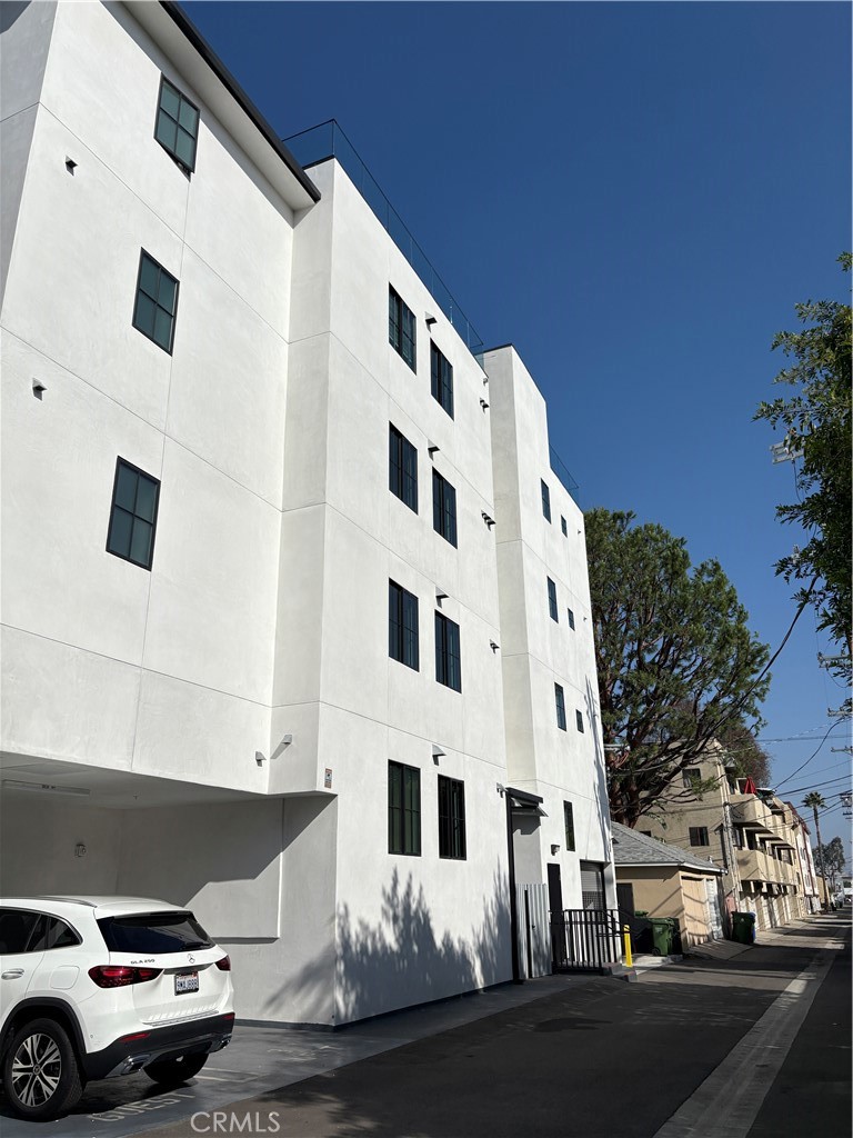 10352 Riverside Drive, Unit 201 Toluca Lake, CA 91602 - Photo 49 of 49 a view of a street with cars