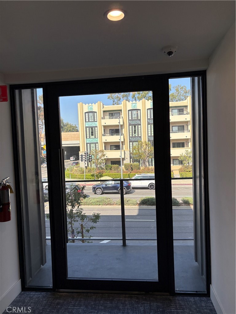 10352 Riverside Drive, Unit 201 Toluca Lake, CA 91602 - Photo 7 of 49 a picture of a room with a large window