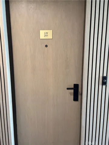 a view of hallway with a window