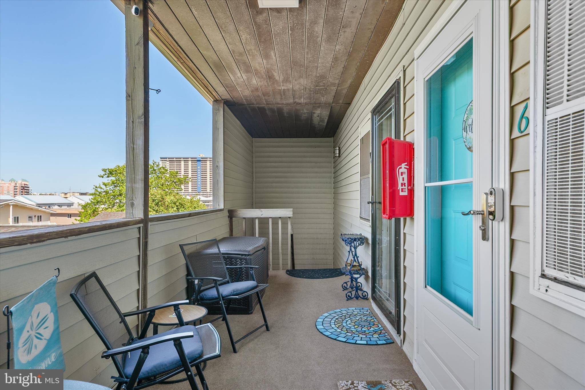 132 Jamestown Road, Unit 601 Ocean City, MD 21842 - Photo 32 of 37 a front view of a house with outdoor seating