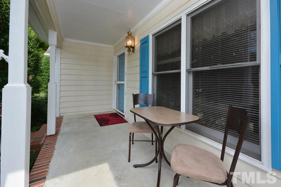 3723 Pickett Road Durham, NC 27705 - Photo 2 of 25 Large enough for breakfast or to watch the thunderstorms roll by