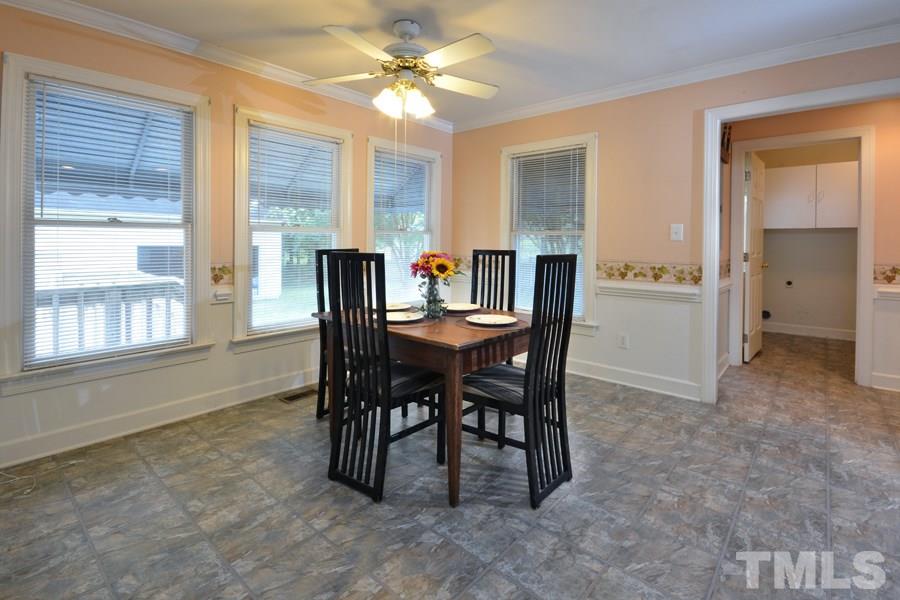3723 Pickett Road Durham, NC 27705 - Photo 10 of 25 looking towards laundry room (with half bath) and entry way from double garage)