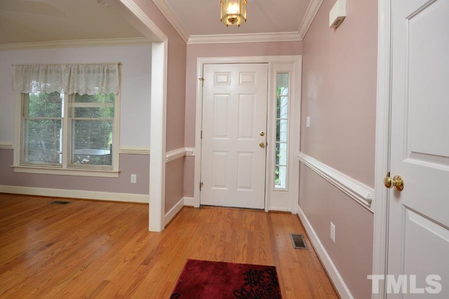 3723 Pickett Road Durham, NC 27705 - Photo 6 of 25 with coat closet, storage room abounds in this home