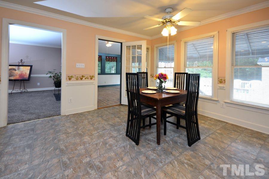 3723 Pickett Road Durham, NC 27705 - Photo 9 of 25 surrounded by windows facing the back of the house