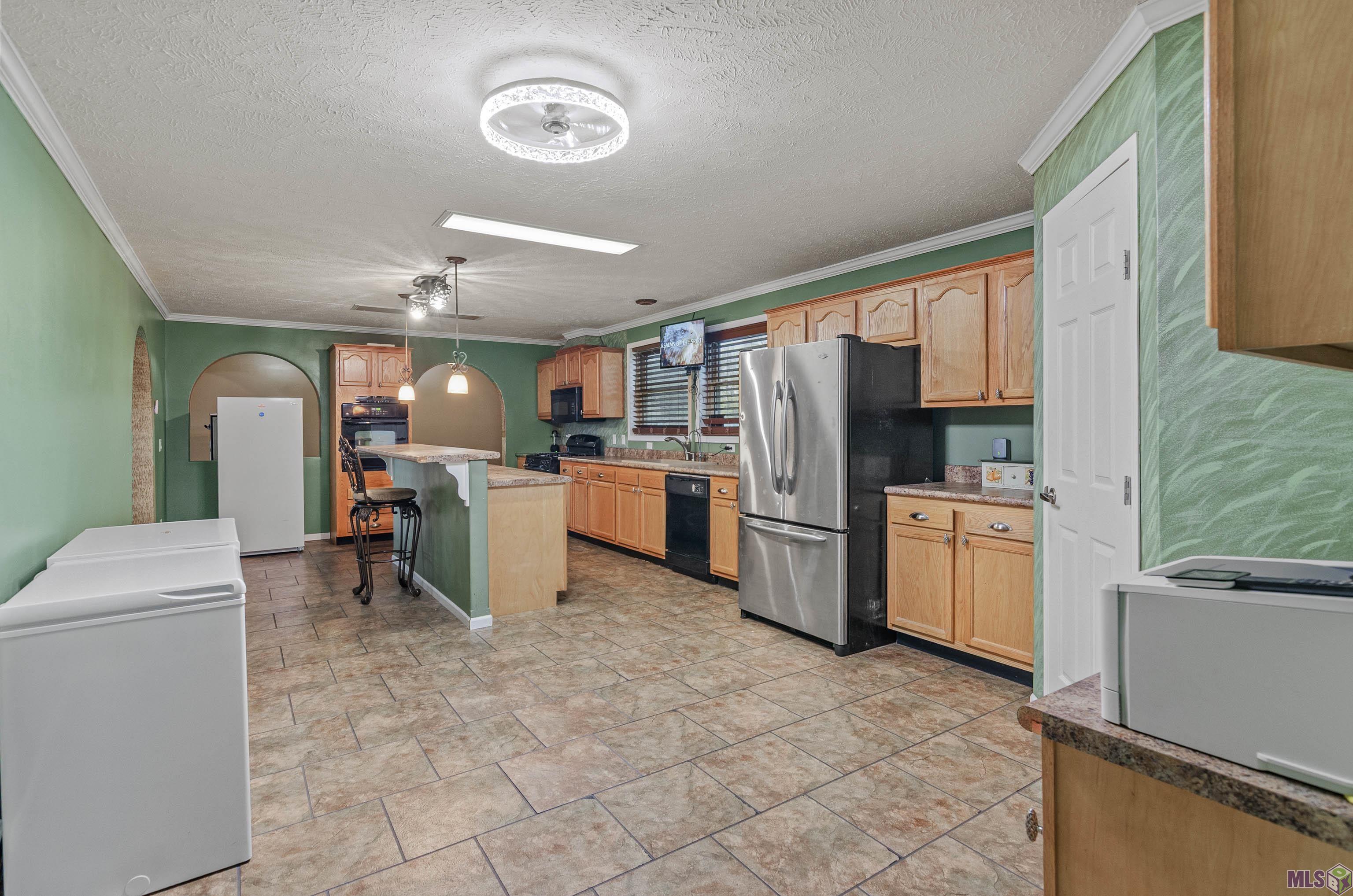 9450 Bueche Road Erwinville, LA 70729 - Photo 9 of 27 Open dining area