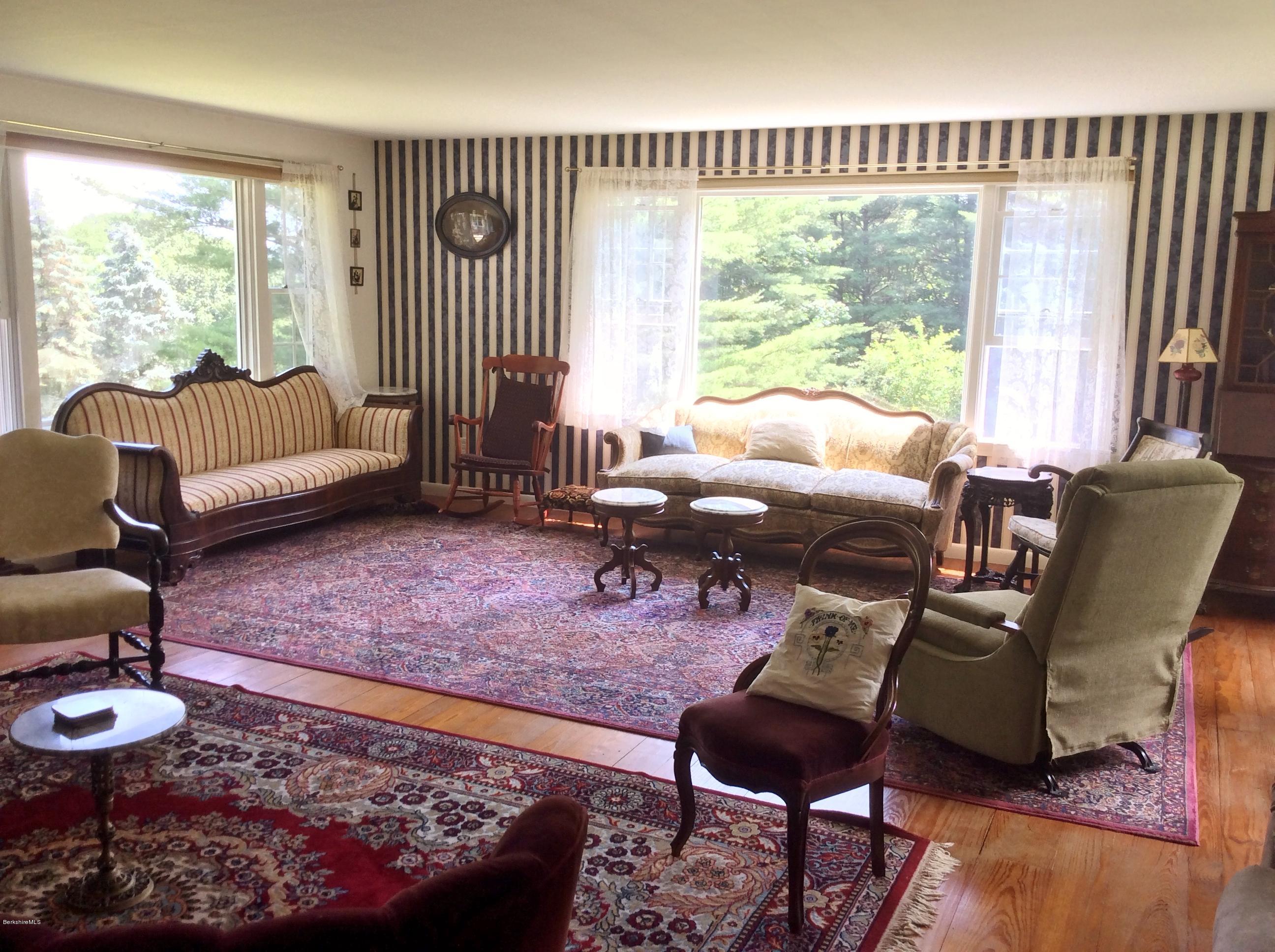 101 Patton Road Richmond, MA 01254 - Photo 3 of 23 a living room with furniture and a large window