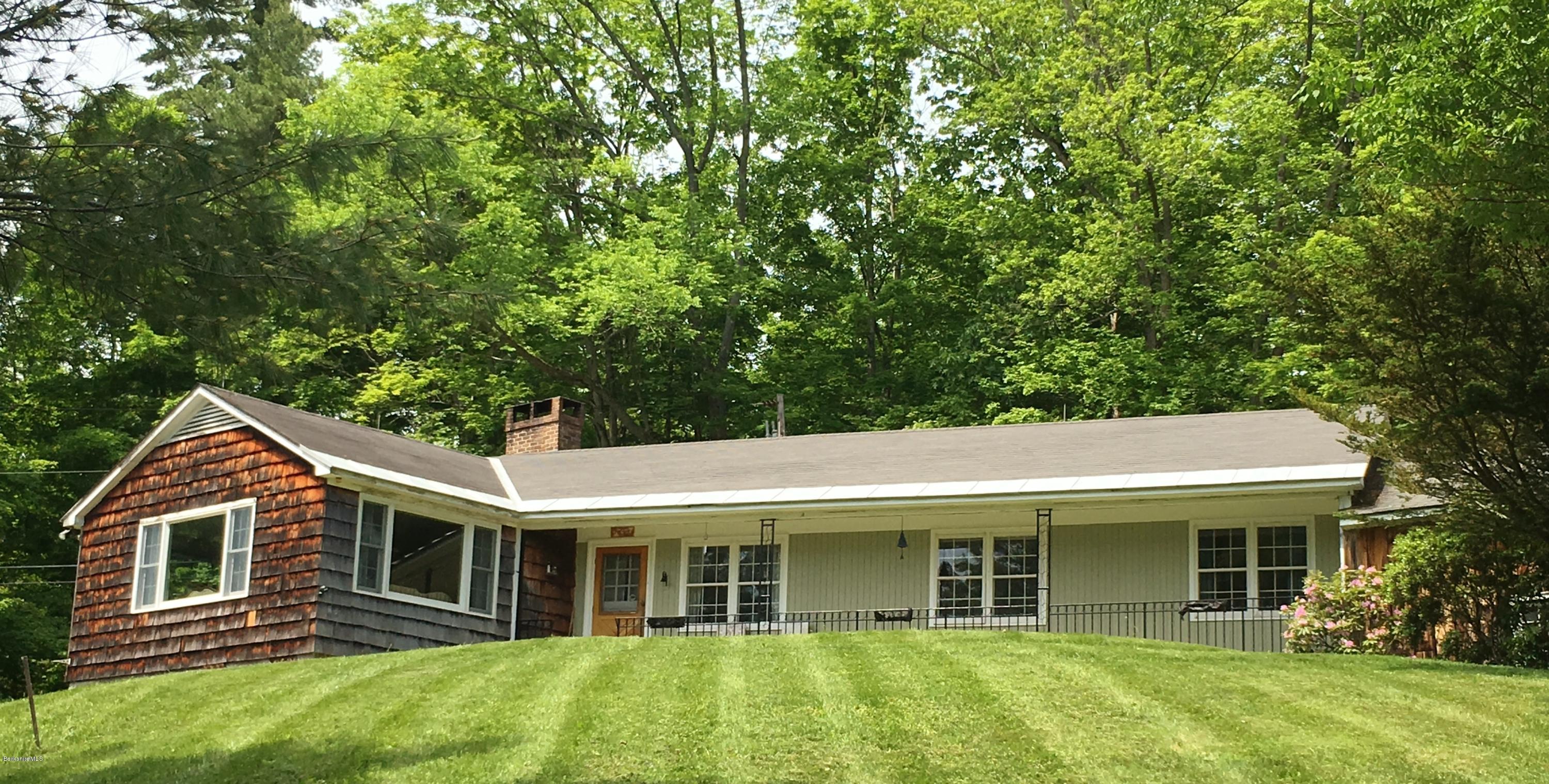 101 Patton Road Richmond, MA 01254 - Photo 22 of 23 a front view of a house with a yard