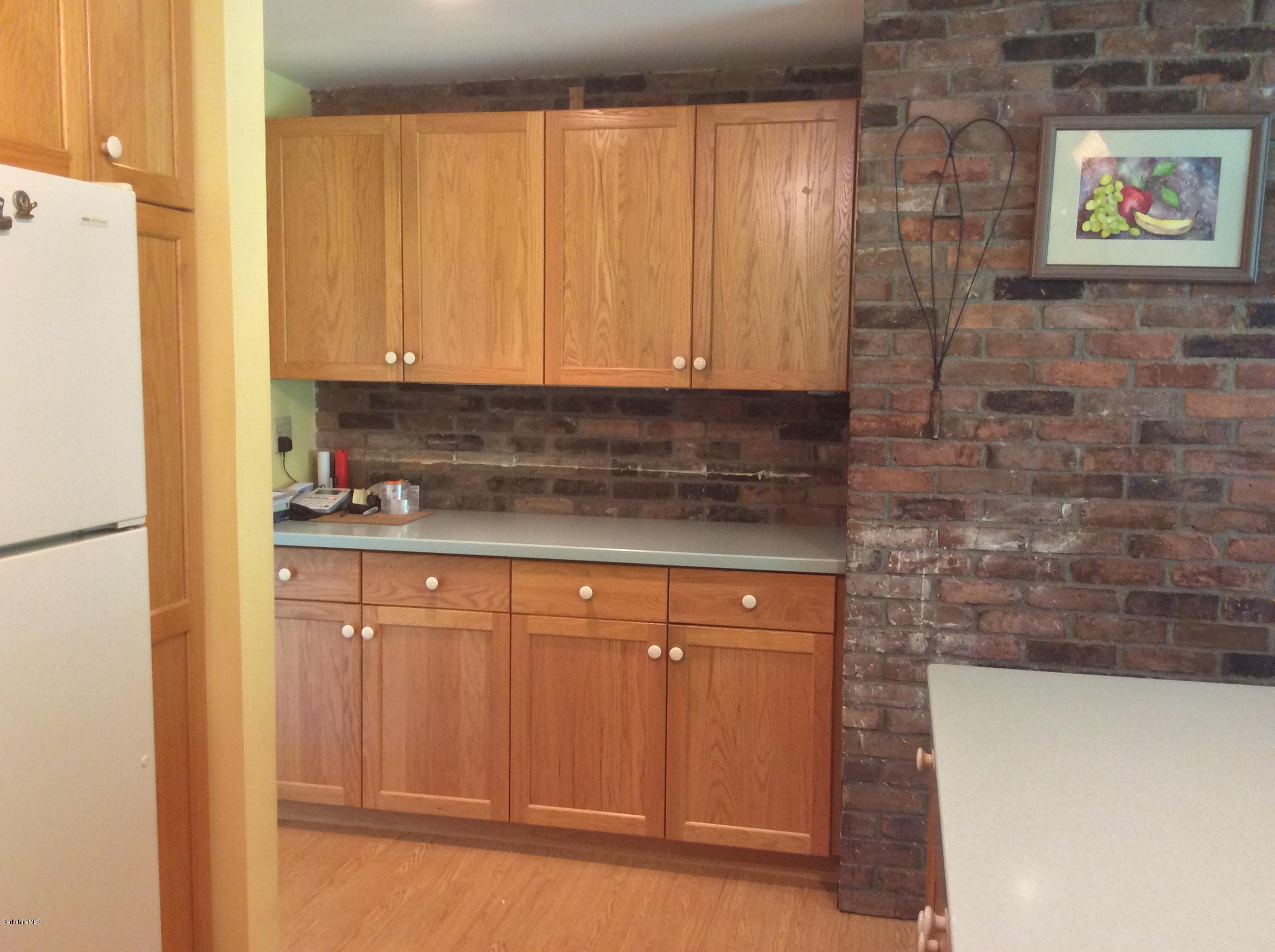 101 Patton Road Richmond, MA 01254 - Photo 9 of 23 a kitchen with a sink and cabinets