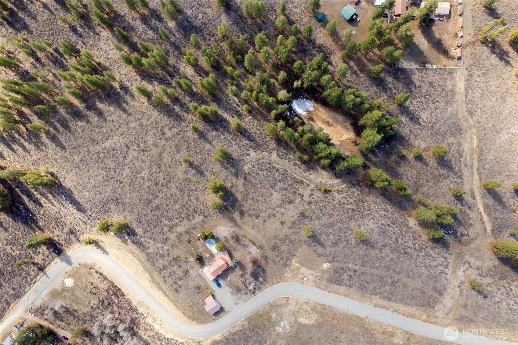 40-tbd Rabbit House Road Winthrop, WA 98862 - Photo 33 of 40 a white and green field with some trees
