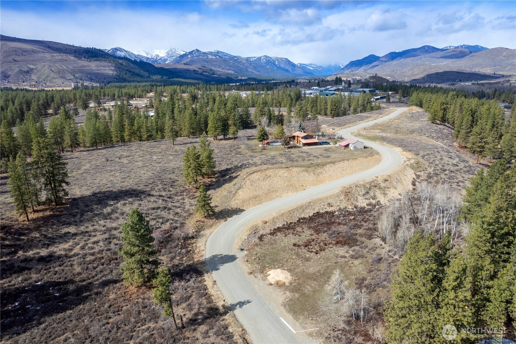 40-tbd Rabbit House Road Winthrop, WA 98862 - Photo 7 of 40 a view of a backyard with a lake