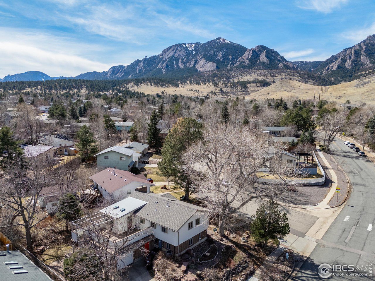 1120 Green Circle Boulder, CO 80305 - Photo 1 of 40 a view of a city with mountains in the background