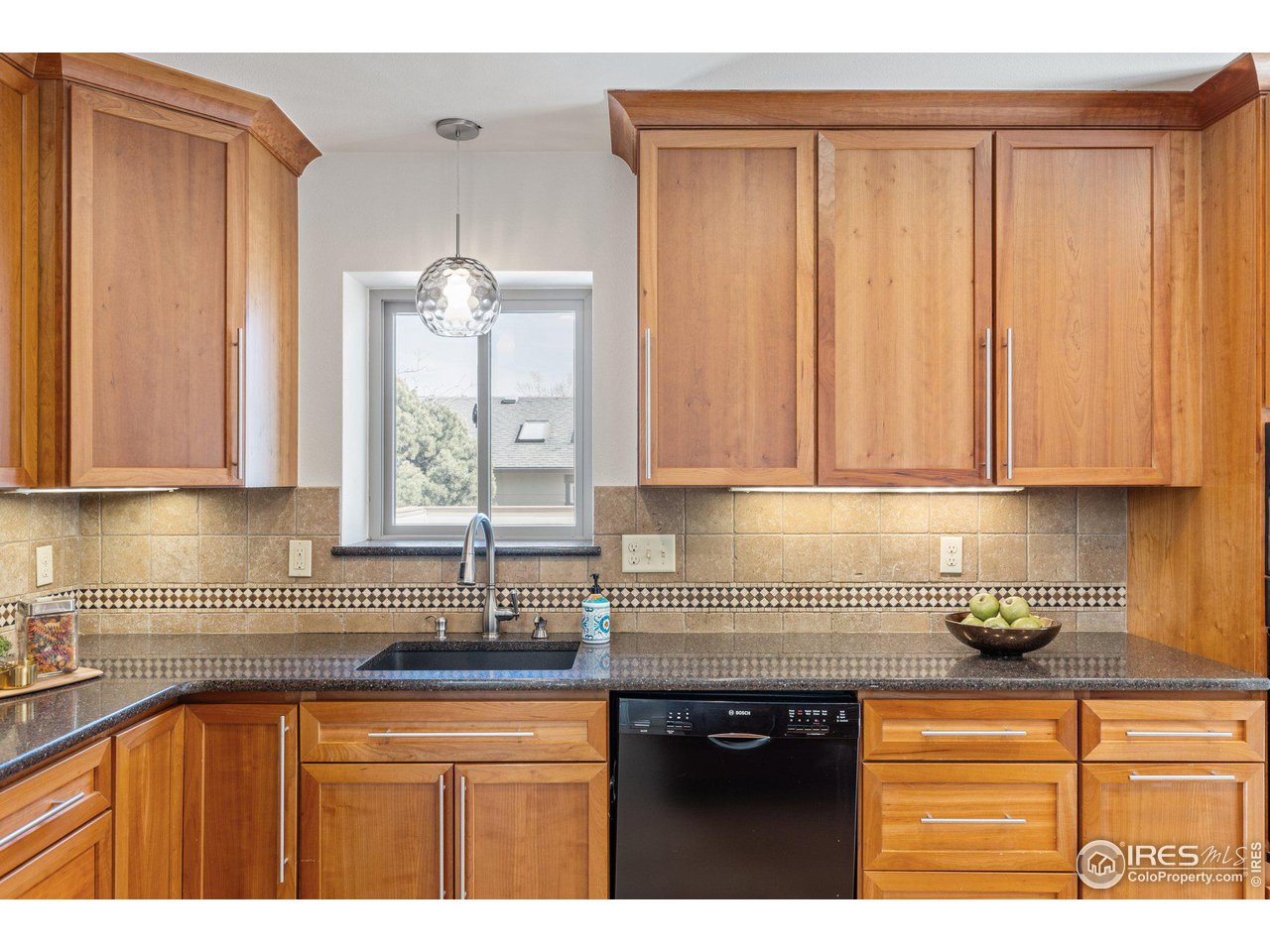 1120 Green Circle Boulder, CO 80305 - Photo 11 of 40 a kitchen with stainless steel appliances granite countertop a sink a refrigerator and a granite counter tops