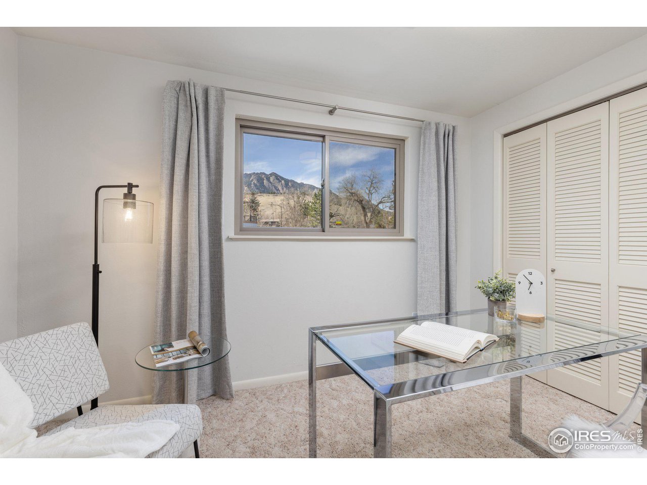 1120 Green Circle Boulder, CO 80305 - Photo 22 of 40 a living room with furniture and a painting on the wall