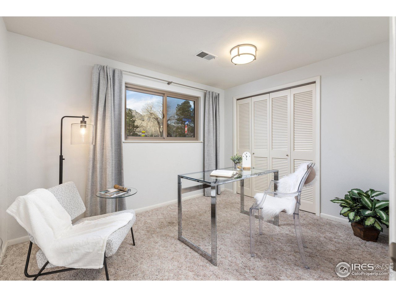 1120 Green Circle Boulder, CO 80305 - Photo 23 of 40 a living room with furniture and a potted plant