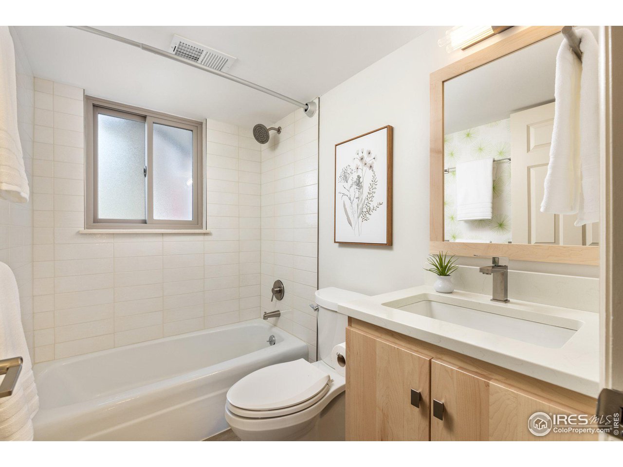1120 Green Circle Boulder, CO 80305 - Photo 25 of 40 a bathroom with a granite countertop sink toilet and bathtub