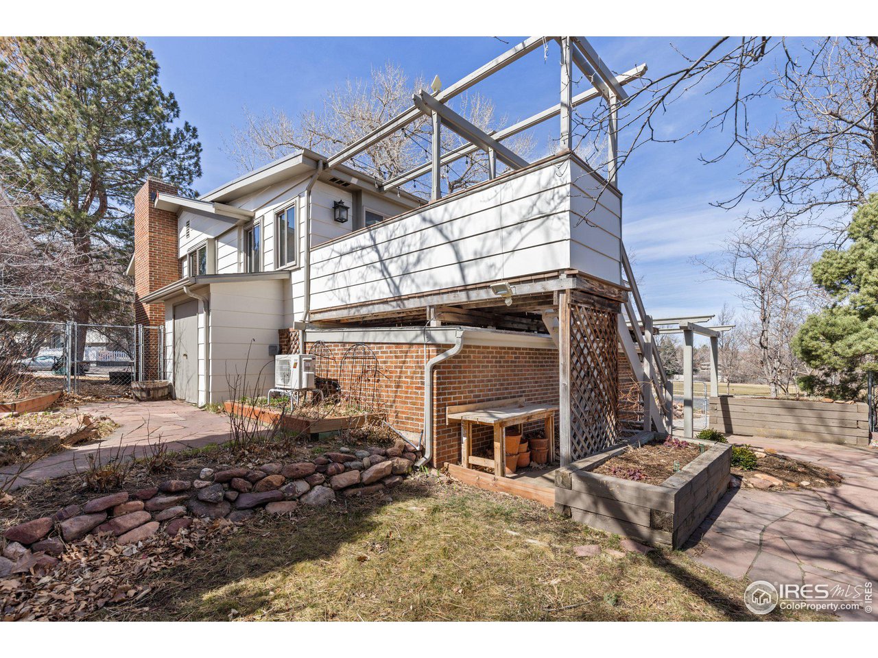 1120 Green Circle Boulder, CO 80305 - Photo 28 of 40 a backyard of a house with yard fire pit and outdoor seating