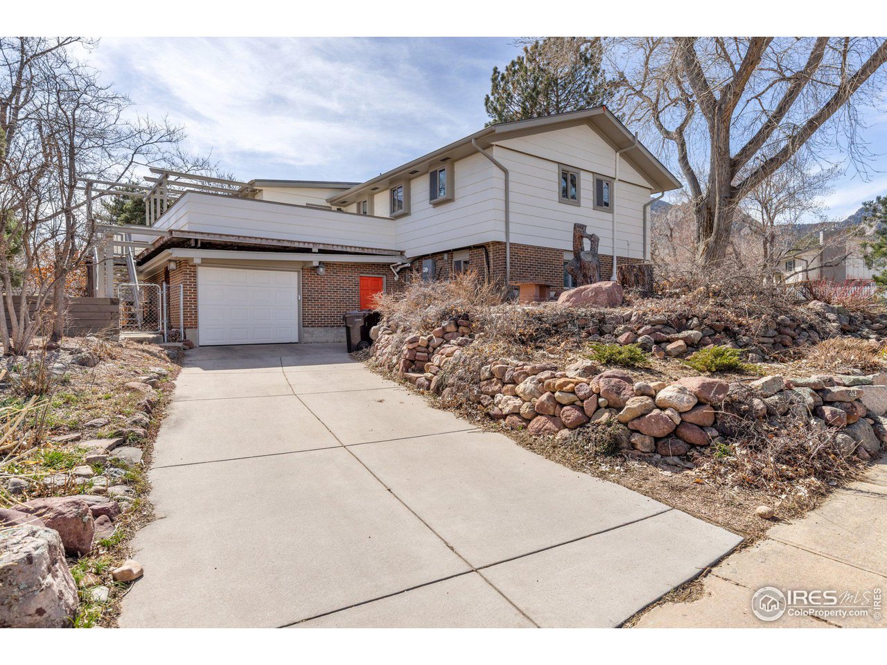 1120 Green Circle Boulder, CO 80305 - Photo 33 of 40 a view of a house with a yard