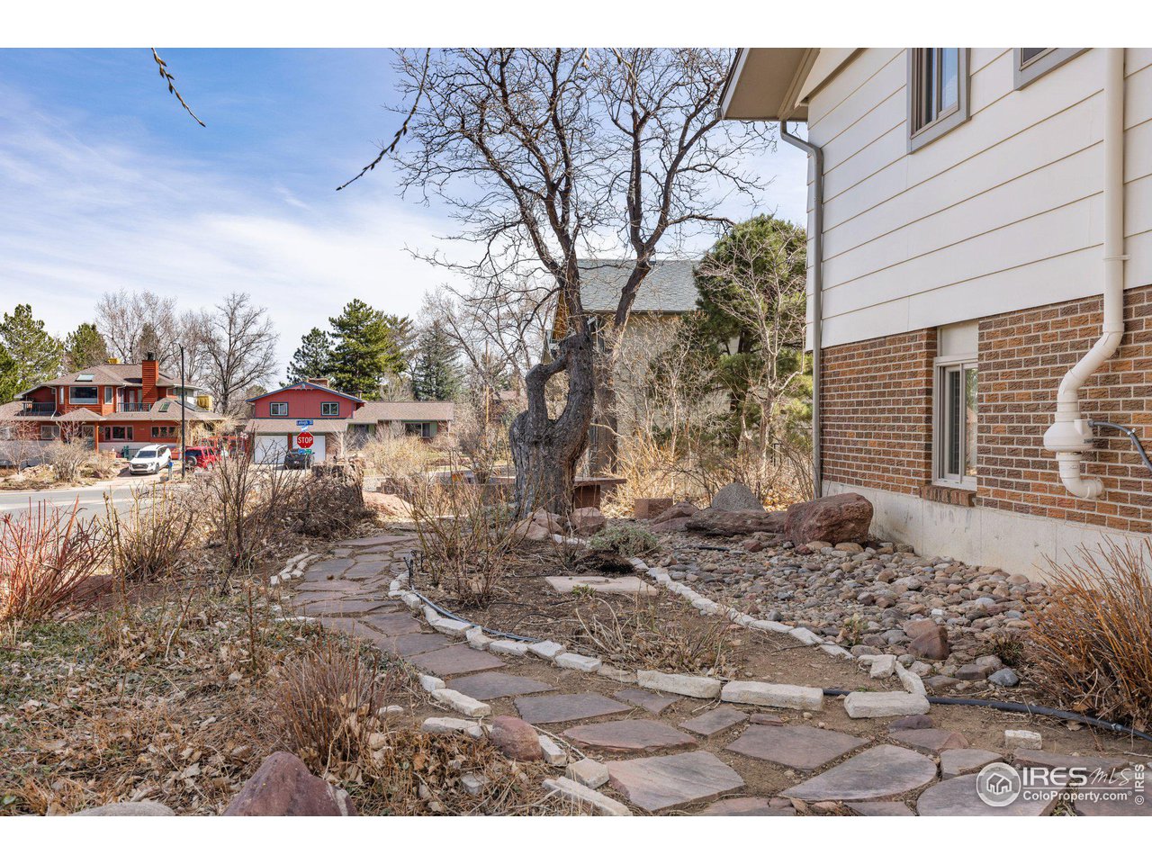 1120 Green Circle Boulder, CO 80305 - Photo 34 of 40 a backyard of a house with yard and outdoor seating
