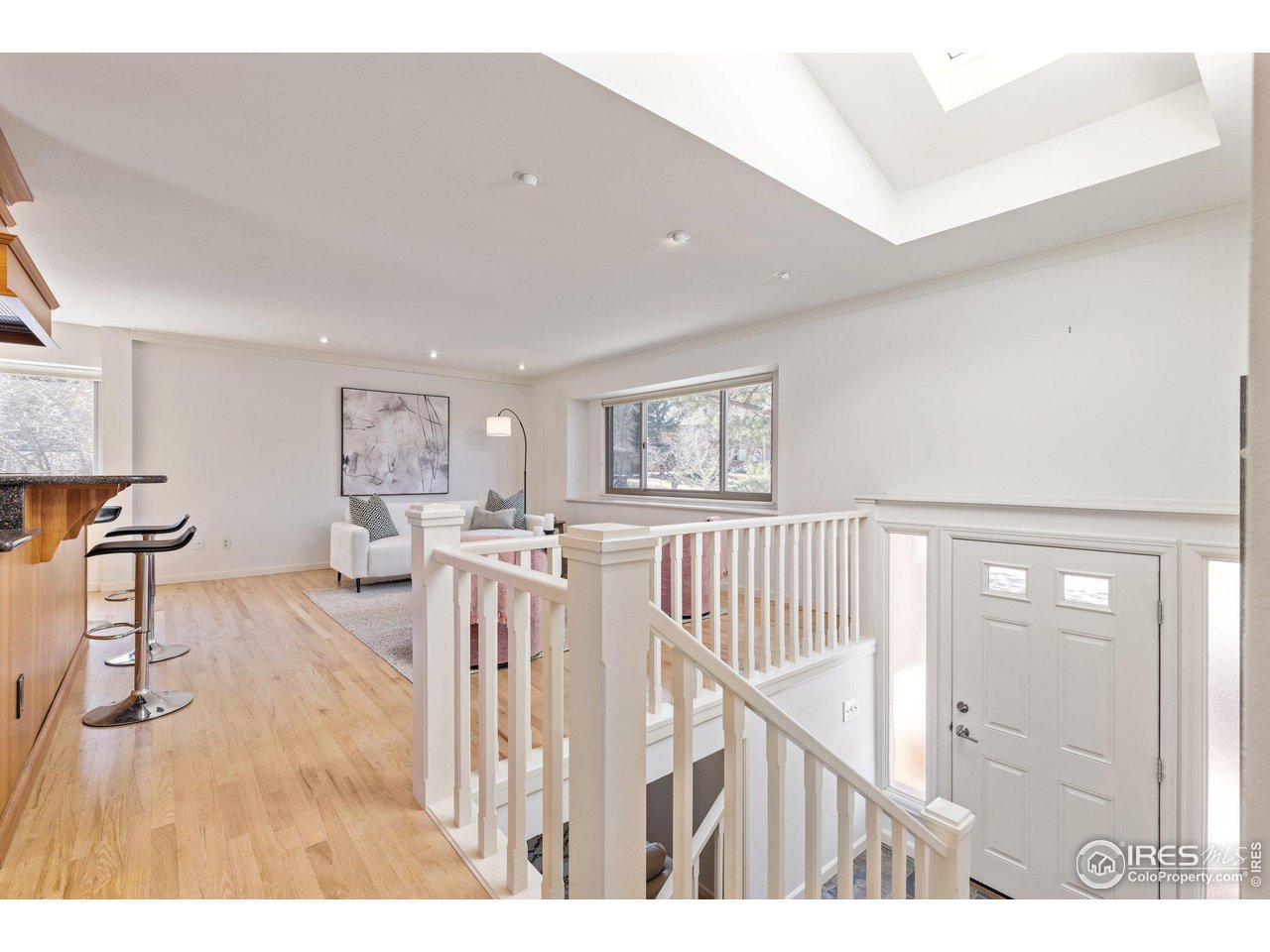 1120 Green Circle Boulder, CO 80305 - Photo 6 of 40 a living room with furniture and a wooden floor