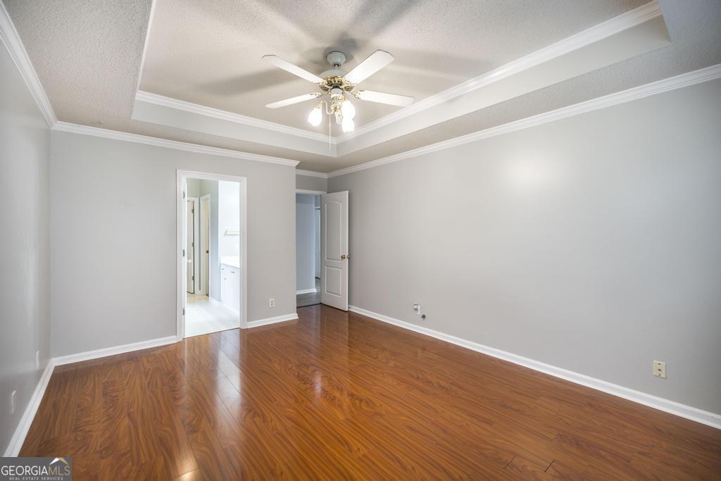 319 Smithville Church Road Warner Robins, GA 31088 - Photo 19 of 34 a view of an empty room with wooden floor